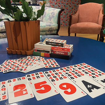 a deck of cards laid out on a coffee table