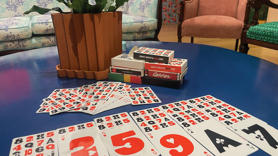a deck of cards laid out on a coffee table