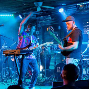 the band Found a Job performing on stage