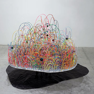 Mindy Shapero, Black balled; Once stuck in the circle trap, you have many choices, one of them is to be black balled until you're no longer able to stand and you are completely out of yourself, on your way to becoming a floating monster head, 2005, Paper, steel, wood, foam, wire, epoxy and acrylic