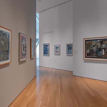 A view of the Kansas Focus Gallery at the Nerman showing many of Zig Priede's works