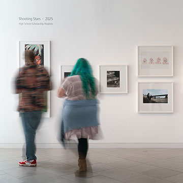 Two patrons view the 2025 shooting stars exhibition at the Nerman Museum of contemporary art