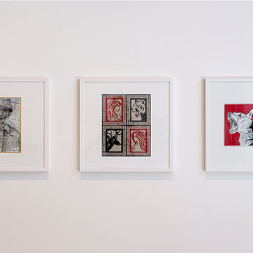 three works of art displayed in a white frames at the 2025 Shooting stars exhibition at the Nerman Museum of contemporary art