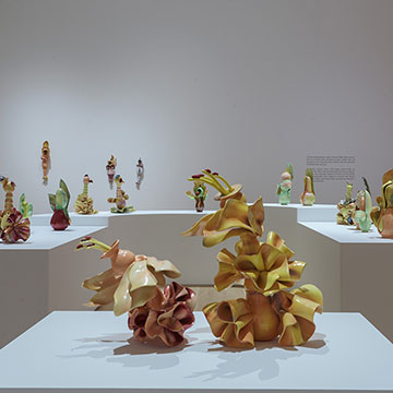 Wavy, organic-shaped ceramic sculptures by Linda Lighton.