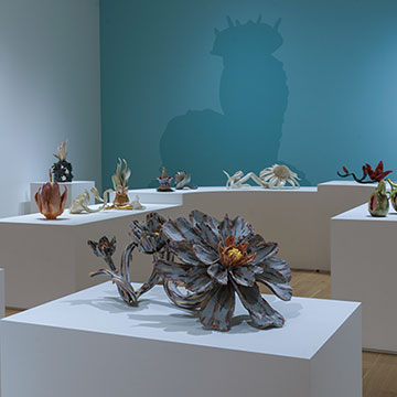 Flower-like sculptures on view at the Nerman during the Love and War Exhibition.