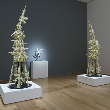 A view of a gallery at the Nerman showcasing sculptures by Linda Lighton set against a dark wall.