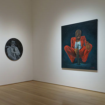 three paintings by Michael Brantley on display at the Nerman Museum of Contemporary Art