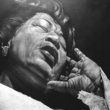 Black and white portrait of a crying woman who is leaning back away from the viewer with one hand raised to the side of her face.