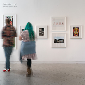 two museum patrons view the shooting stars exhibition at the Nerman